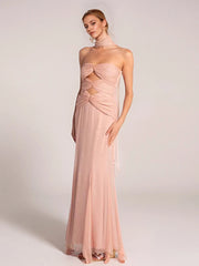A model wearing a stylish pink twisted tube mermaid midi dress, showcasing its unique design. Golden Atelier 2