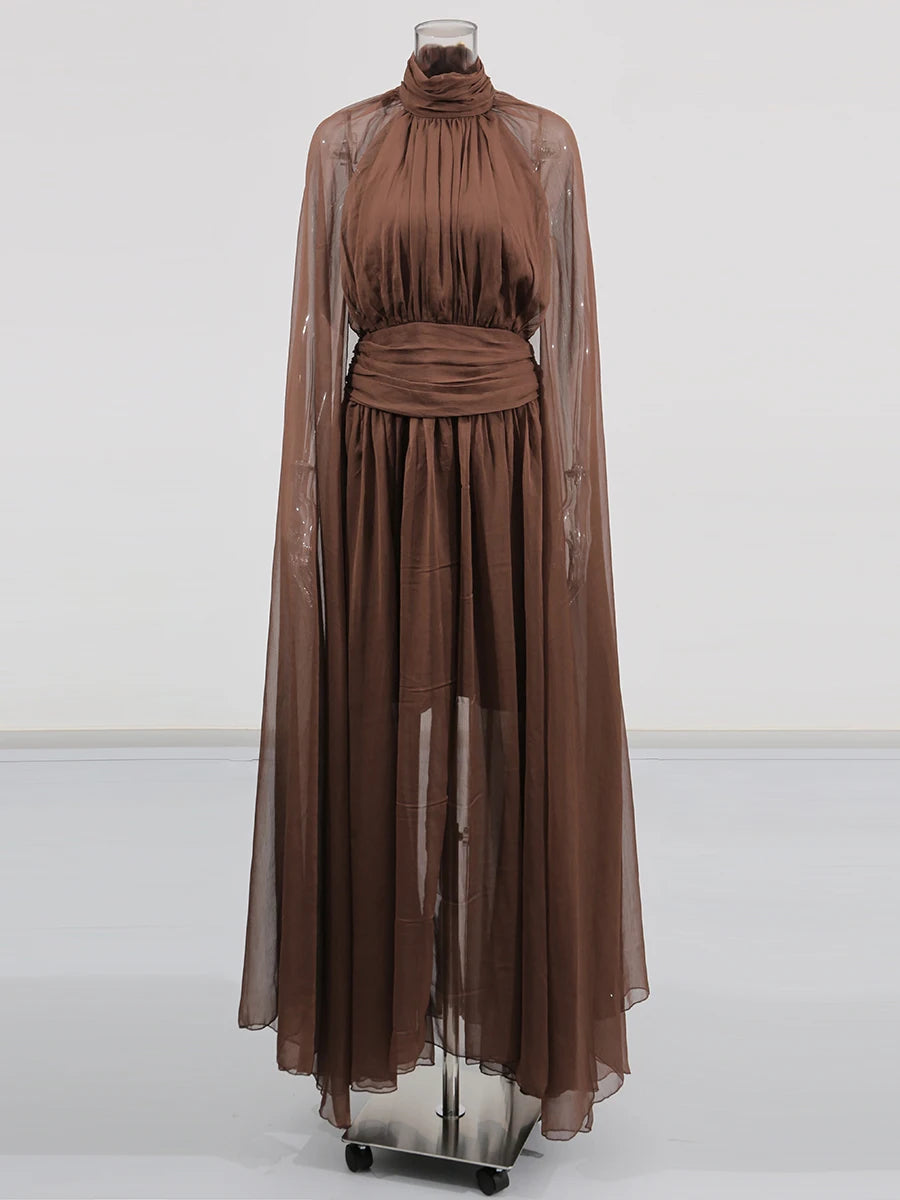 Brown dress on a mannequin against a white background