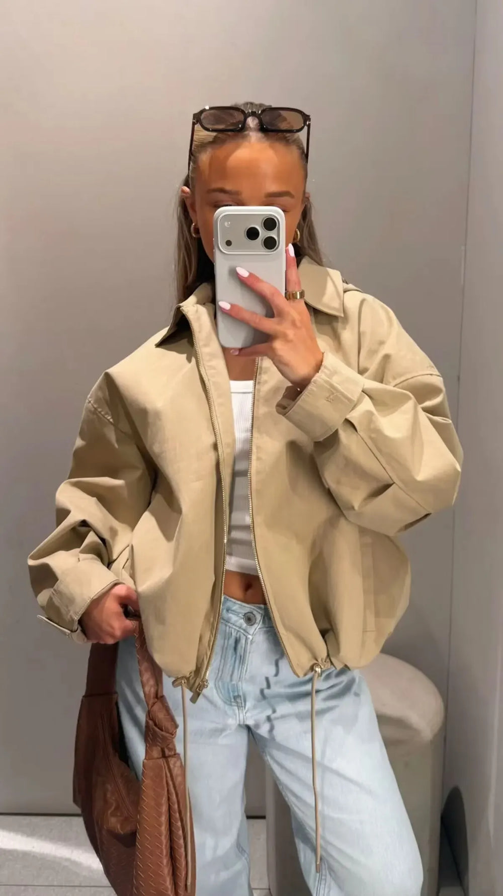 Jacket with detachable hood and drawstring hem
