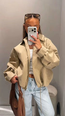 Jacket with detachable hood and drawstring hem
