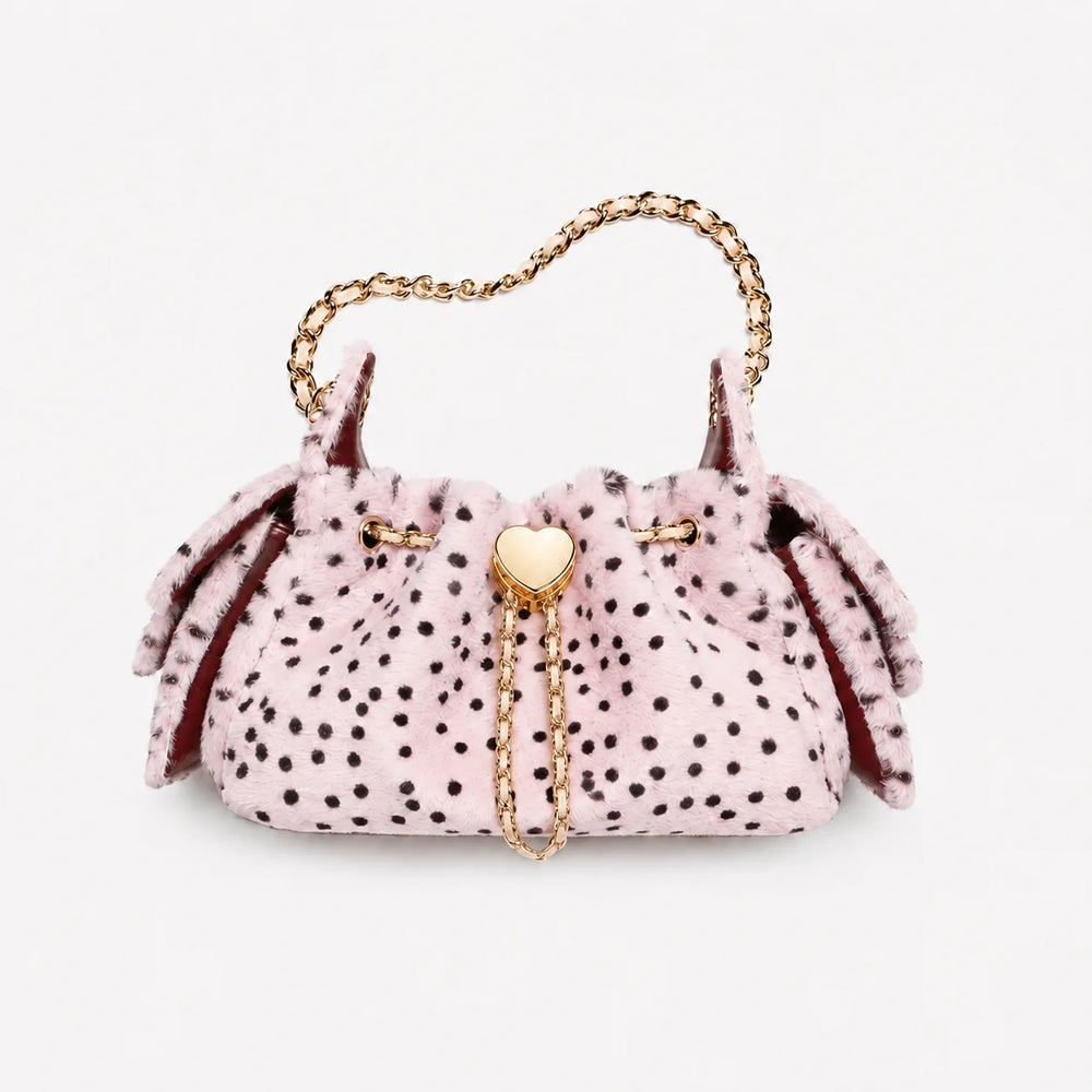 Pink faux fur bucket bag with leopard spots and gold heart clasp