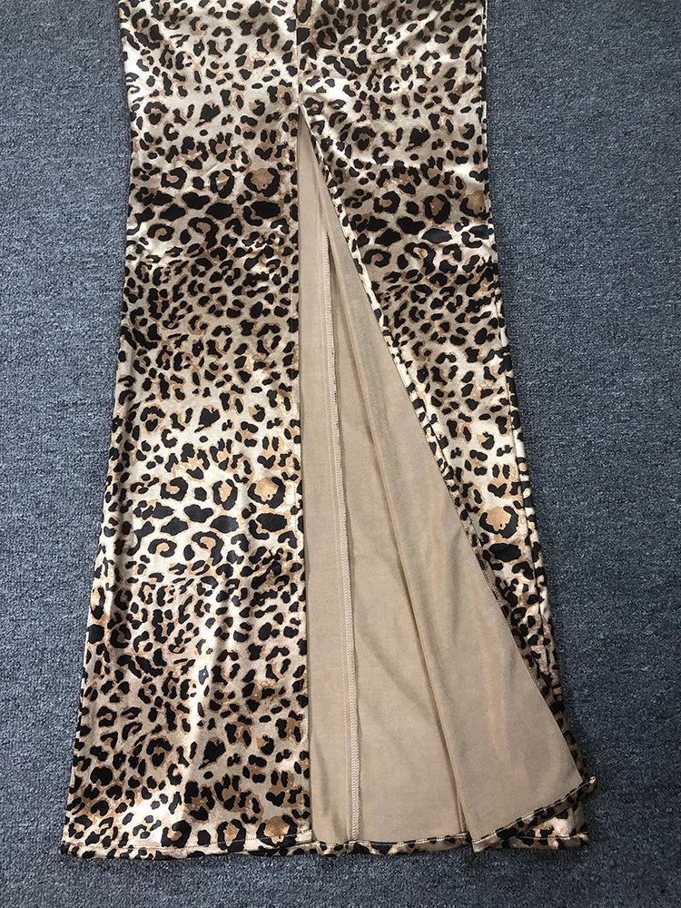 Leopard print scarf with a beige center on a blue textured background