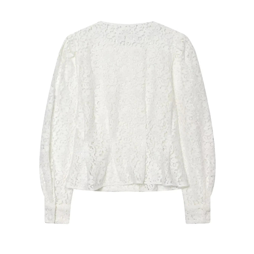 Back view of a white lace double-breasted cropped jacket.