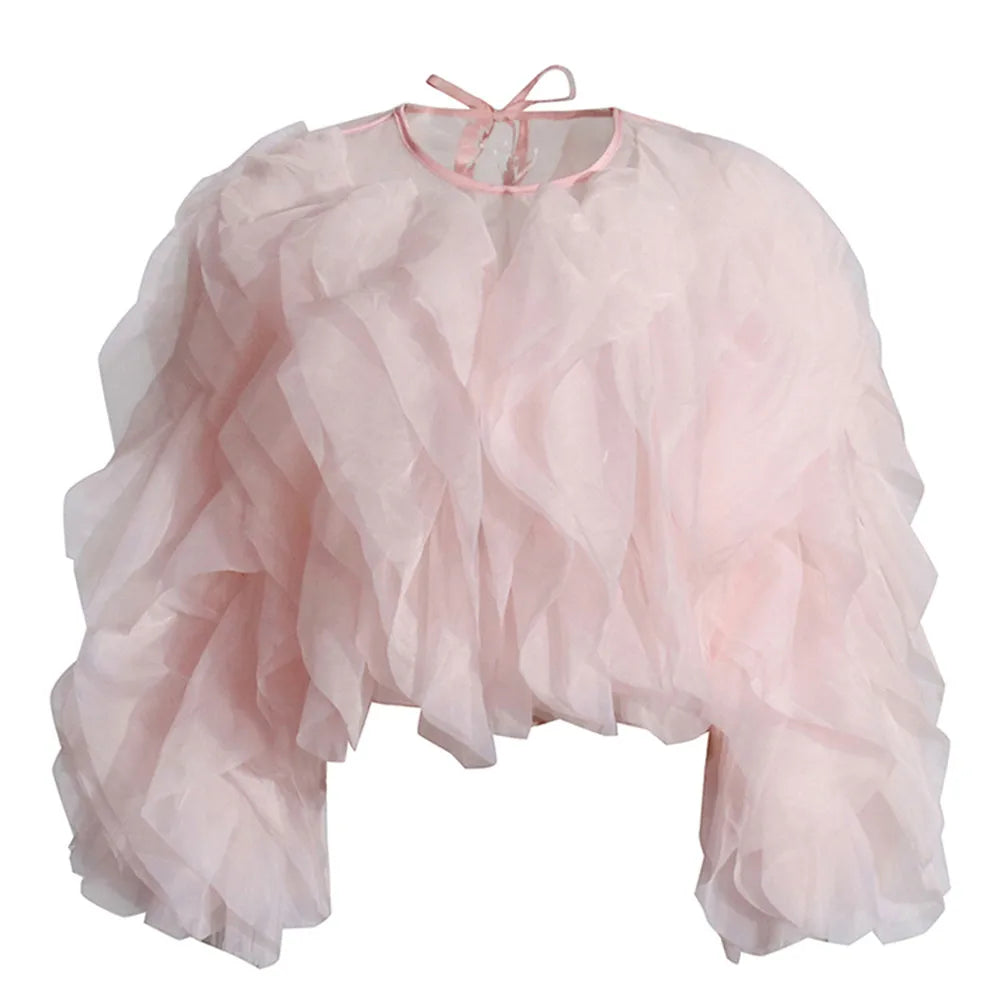 Pink ruffled shrug on a white background
