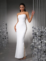 Strapless pearl embellished bodycon maxi dress with side mesh paneling and hand on hip