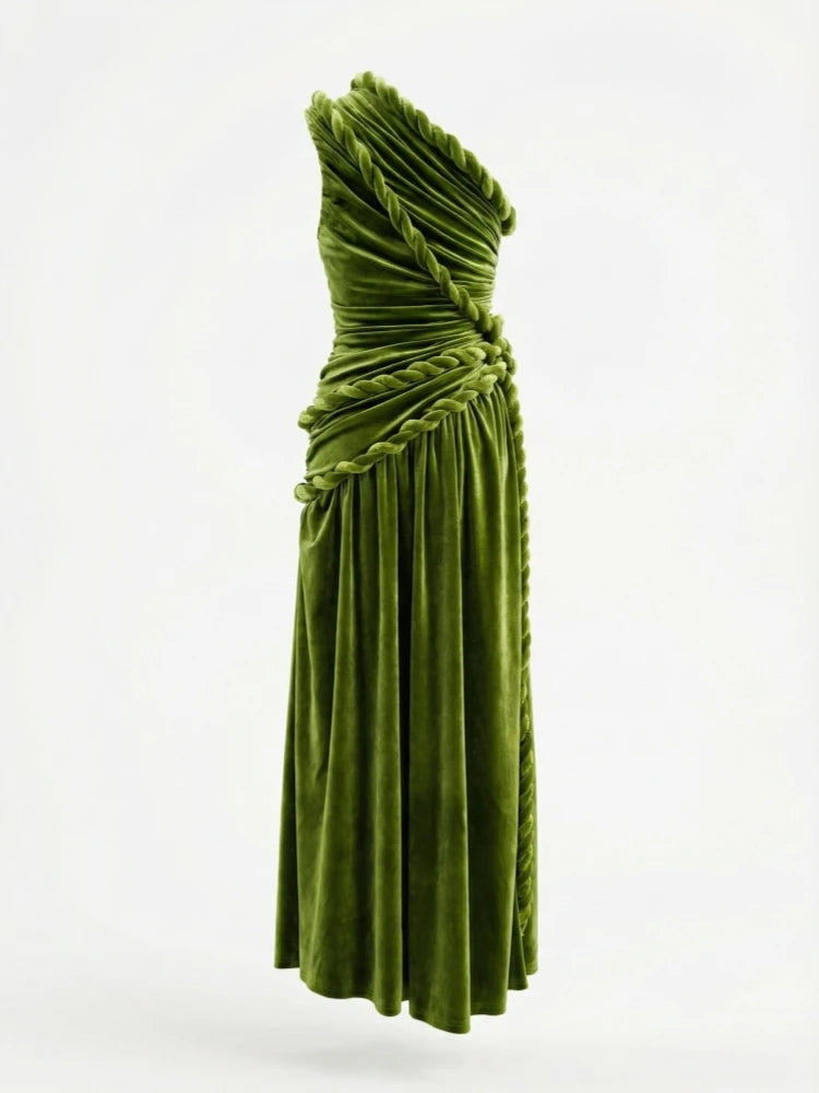 Green dress with ruched details on a white background