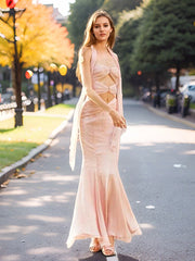 A model wearing a stylish pink twisted tube mermaid midi dress, showcasing its unique design. Golden Atelier 4