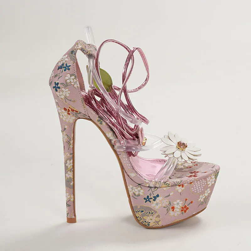 Pink floral high-heeled shoe with clear platform 