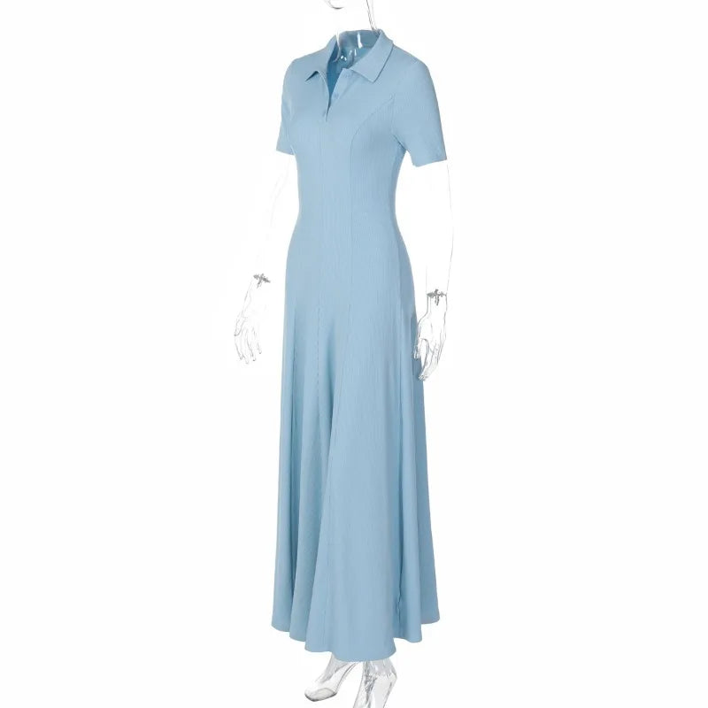 Light blue dress on a mannequin against a white background