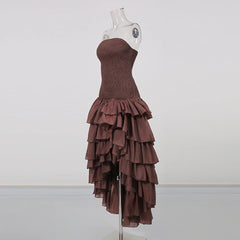 Strapless ruffle asymmetrical hem dress on mannequin side view