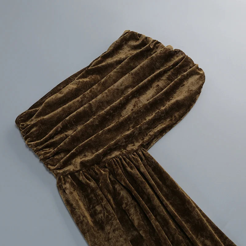 Close-up of ruched velvet asymmetrical skirt overlay
