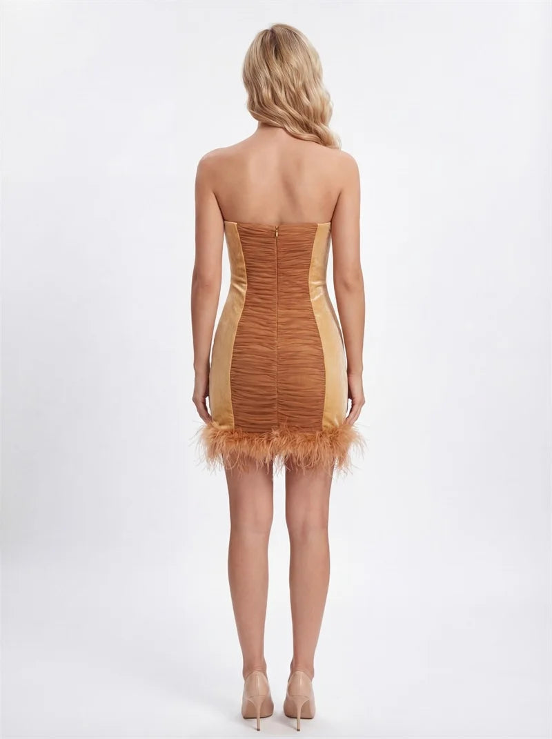 Strapless mini dress with feather trim and ruched bodice