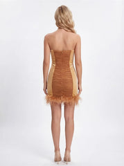 Strapless mini dress with feather trim and ruched bodice