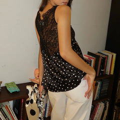 Sleeveless V-neck lace bodice polka dot satin peplum tank top back view