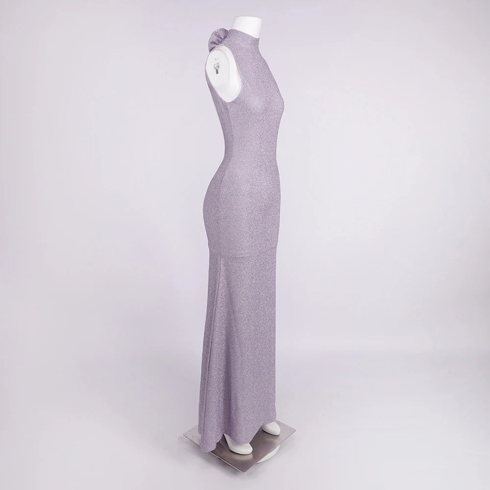 Mannequin wearing a long, fitted gray dress on a white background