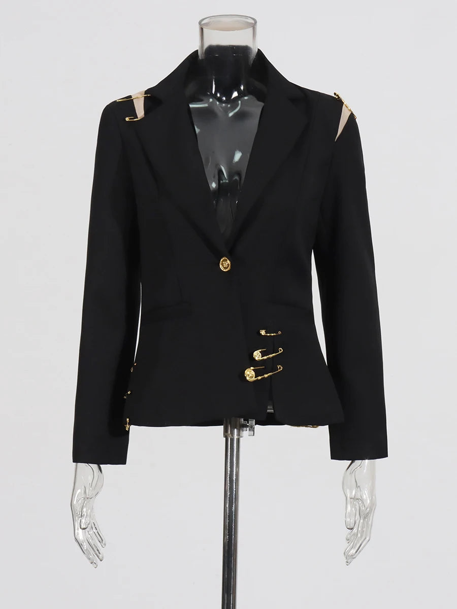 Black blazer with gold buttons on a mannequin against a white background