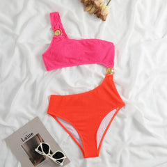 Ribbed one-piece swimsuit pink and orange laid flat