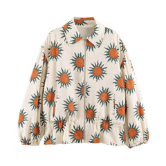 Sunflower print bomber jacket worn by model indoors