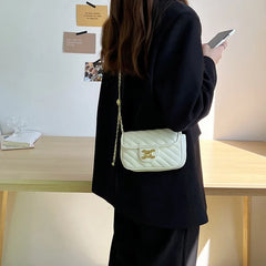 A woman wearing the crossbody bag, demonstrating its versatility and comfortable fit for everyday use.