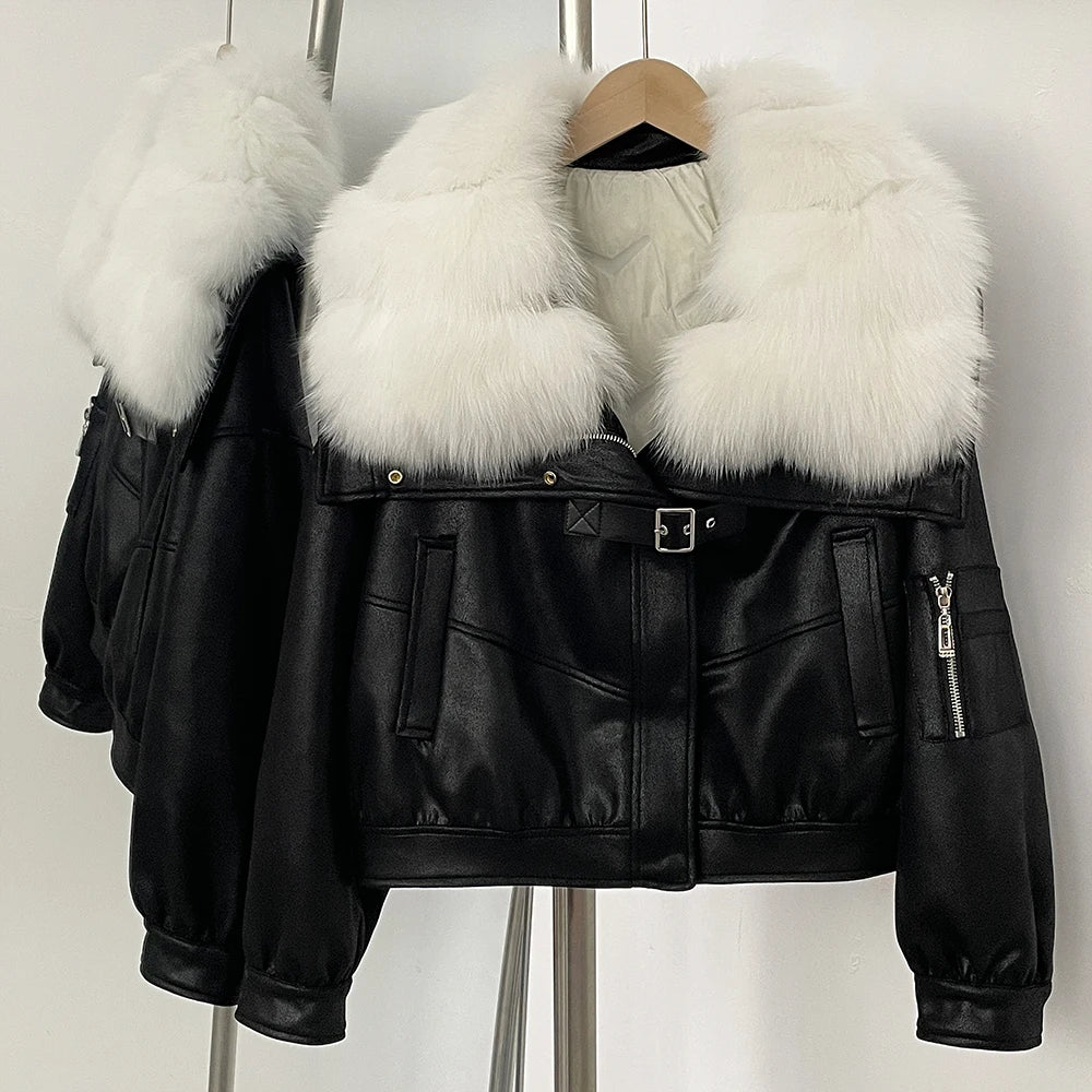 Black leather jacket with white fur collar on a hanger against a white background