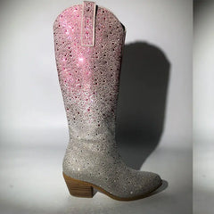 Silver cowboy boot with pink top on a white background