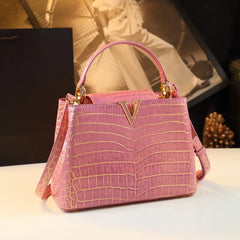 A luxurious gradient crocodile pattern leather bag with a prominent V-letter accent. Golden Atelier 2