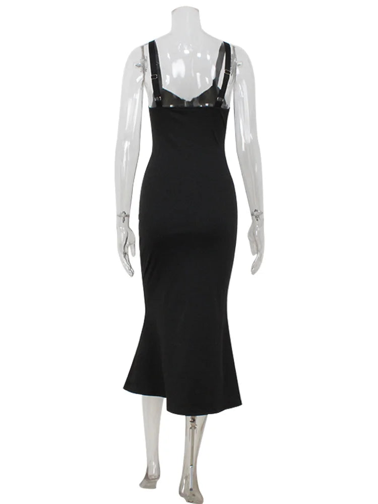 Black dress on a mannequin against a white background