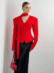 Red padded shoulder v-neck blazer with long sleeves and single-breasted buttons.