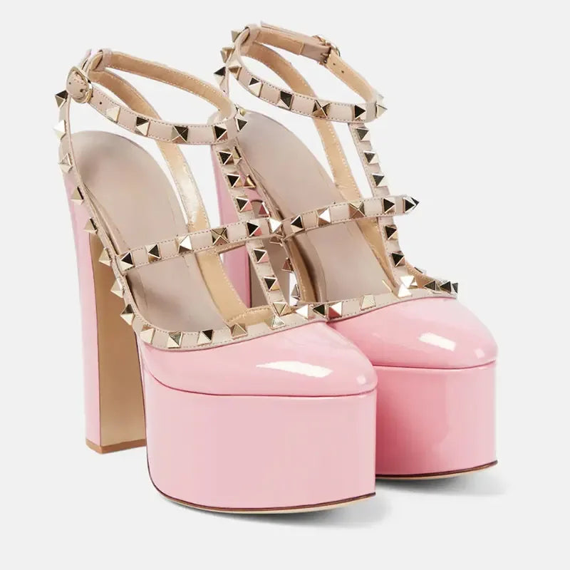 Pink platform high heels with gold studded details
