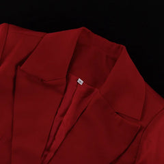 Close-up of a red shirt with a collar on a black background