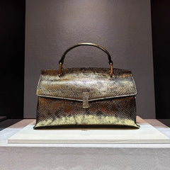 Gold snake stitching leather handbag