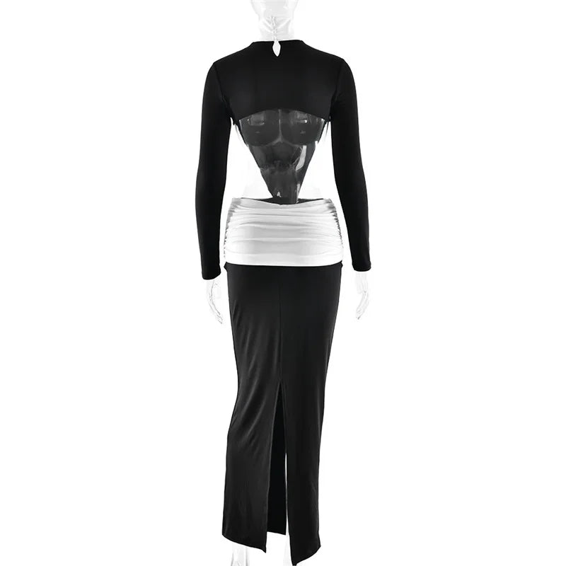 Black and white dress on a mannequin against a white background