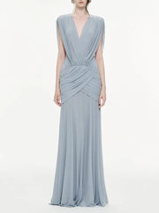 Full body view of V-neck draped maxi dress in light blue