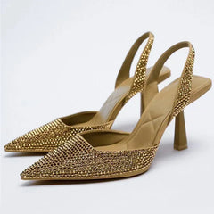 Gold crystal slingback pointed toe pumps