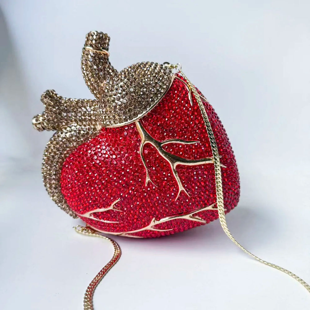 Red crystal embellished heart shaped bag with gold chain
