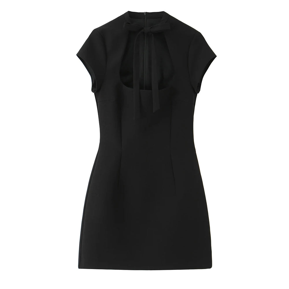 Black dress with a tie neckline on a white background