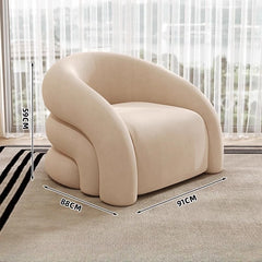 Plush recliner seat with wood frame and soft neutral upholstery