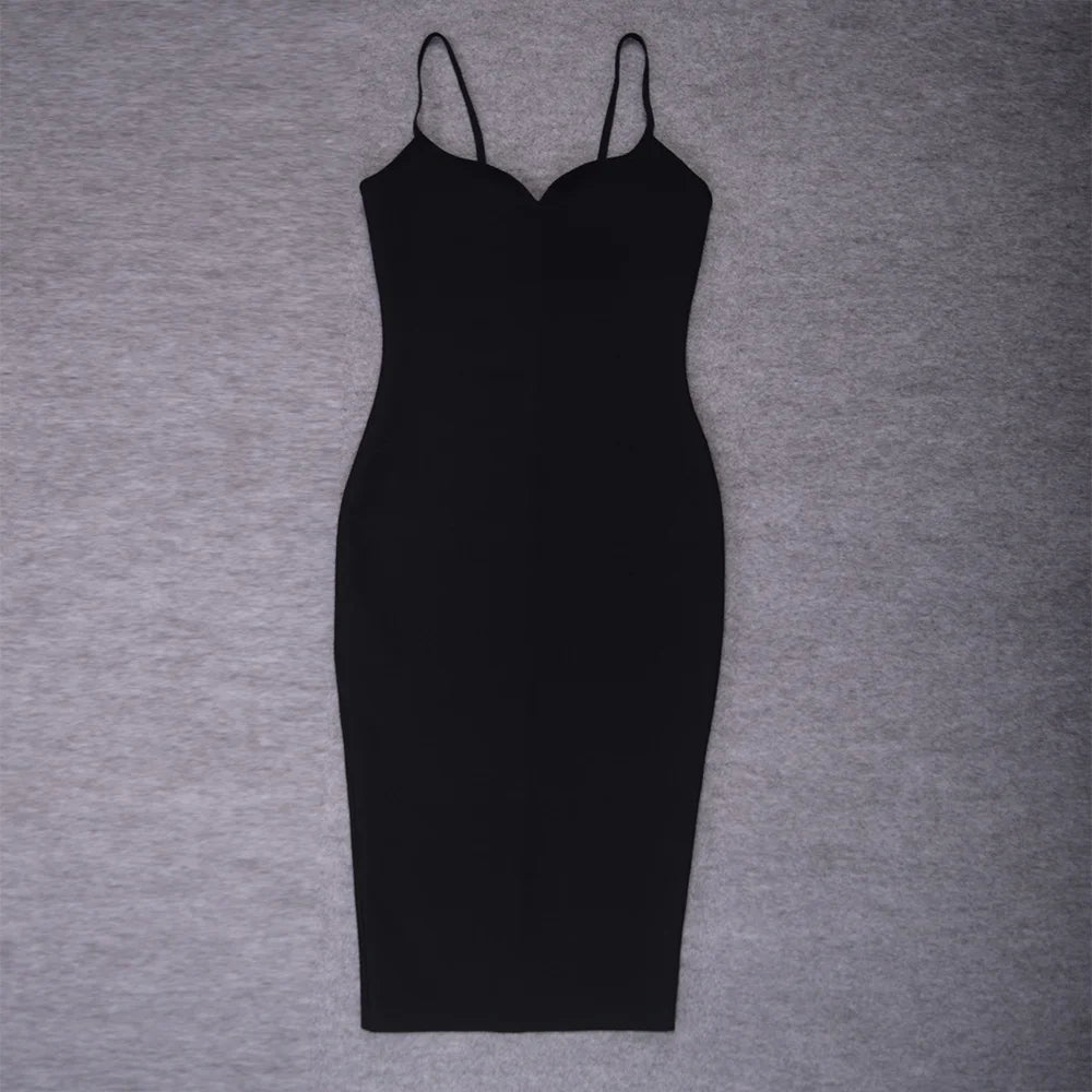 Black slip dress on a gray background