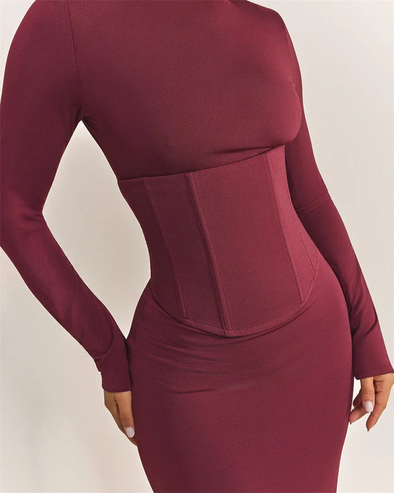 Maroon waist trainer on a neutral background