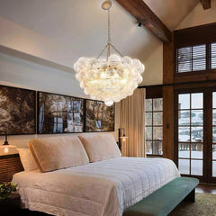 A stunning glass bubble chandelier hanging in a modern living room, creating a captivating focal point. Golden Atelier 3