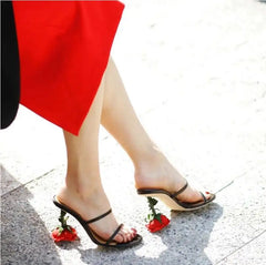 A woman wearing the rose gold floral heels with a summer dress, showcasing their elegant style. Golden Atelier 4