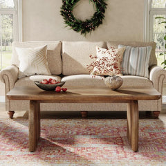 Wood coffee table with sturdy base, modern design, U.S. Origin.