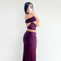 Purple mesh two-piece set with sheer backless halter top and long skirt for women.