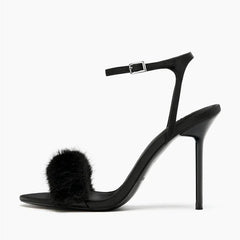 Side view of black faux fur strap stiletto heel sandal