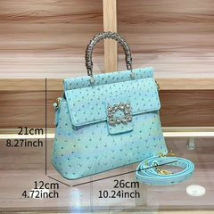 Dimensions of the blue ostrich print textured handbag, showing height, width, and depth.