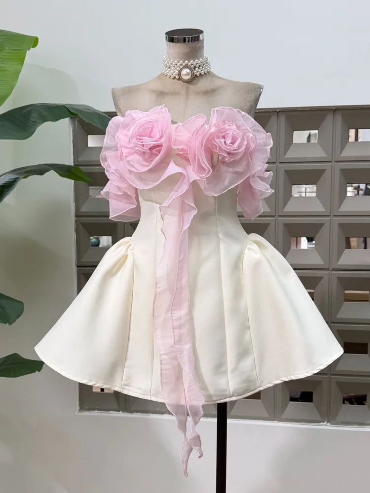 Strapless mini dress with 3D floral appliques and flared skirt