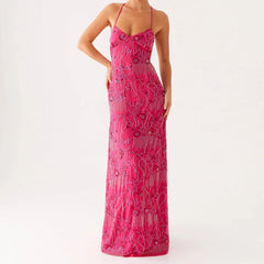 Pink patterned dress on a white background