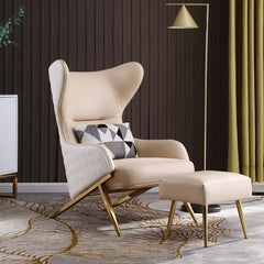 A modern metal and velvet living room sofa chair with a beige upholstered seat and backrest, and a gold-colored metal frame, displayed in a stylishly decorated living room setting.