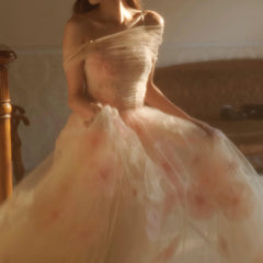 An elegant A-line formal dress with a sweetheart neckline and off-shoulder straps.