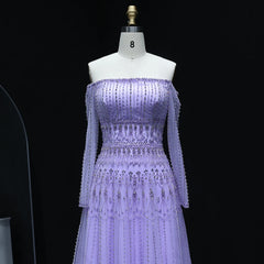 A-line  Lilac sweep train party dress in sage displayed for a wedding  on a mannequin against a black background